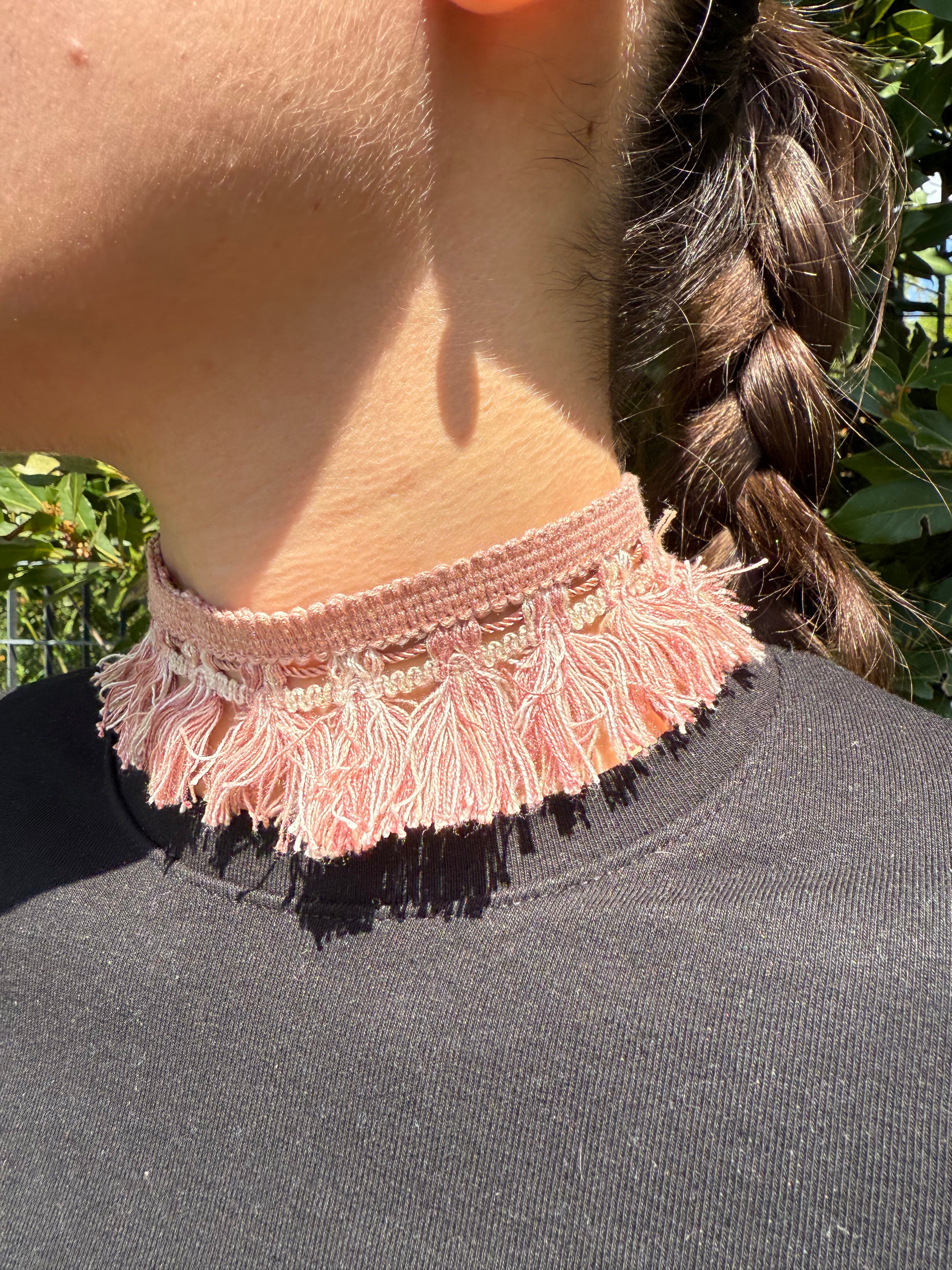 PASSAMANERIA CON FRANGE ROSA