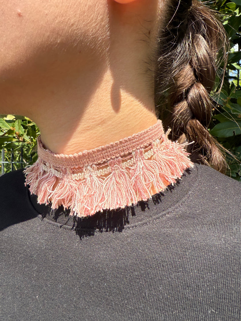 PASSAMANERIA CON FRANGE ROSA