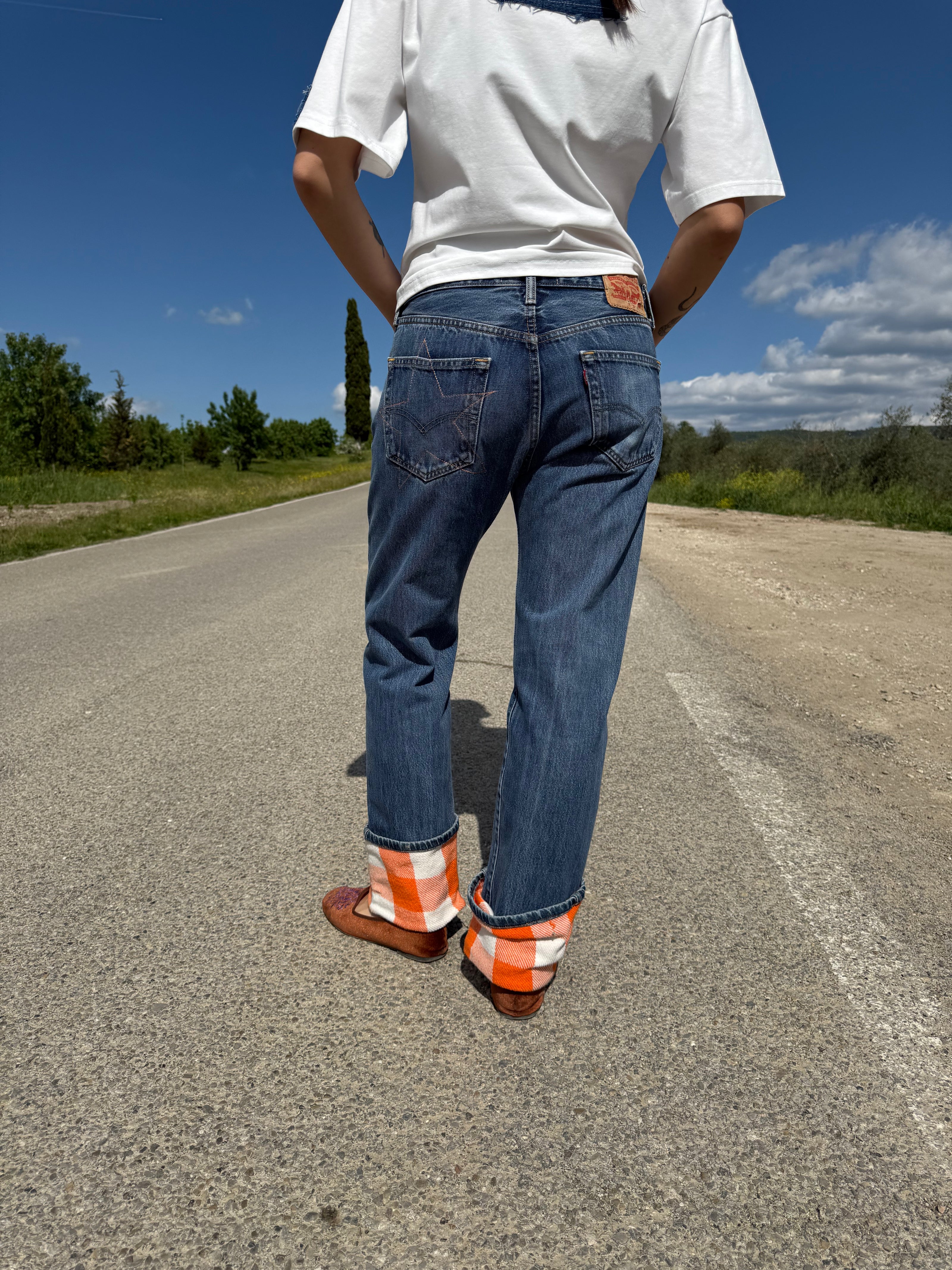 SCACCHI PANTS – jeans con risvolto fantasia a scacchi