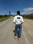 SCACCHI PANTS – jeans con risvolto fantasia a scacchi